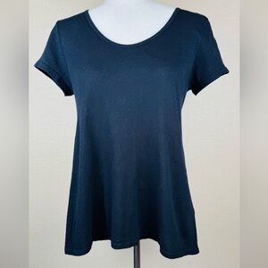 Anthropologie Left of Center woman’s black t-shirt. Asymmetrical hemline. Size M